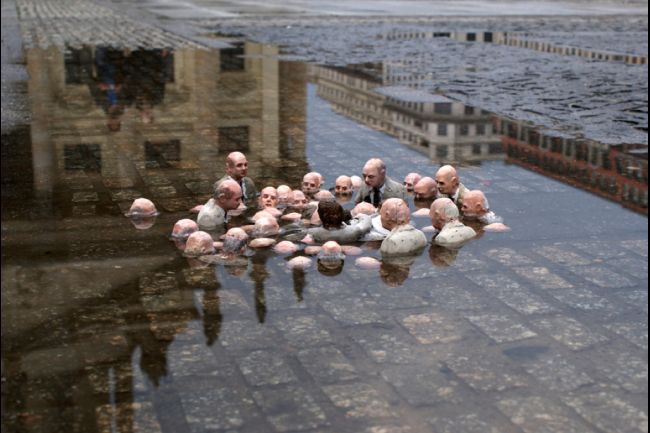 'Politicians Discussing Global Warming' by Isaac Cordal