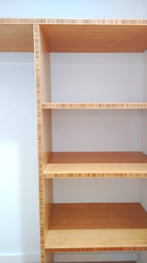 Laminated bamboo panels used for shelving in our hall closet